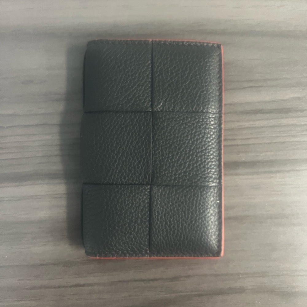 Black and red strip  pocket organizer from Bottega Veneta